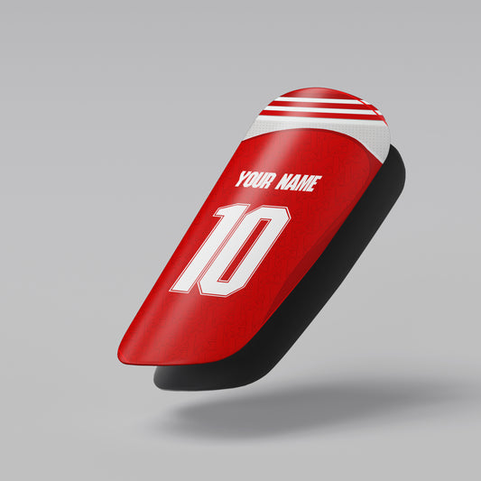 Red motorcycle seat with white number '10' and text on a gray background