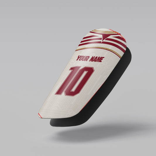 Soccer cleat with customizable name and number on a gray background