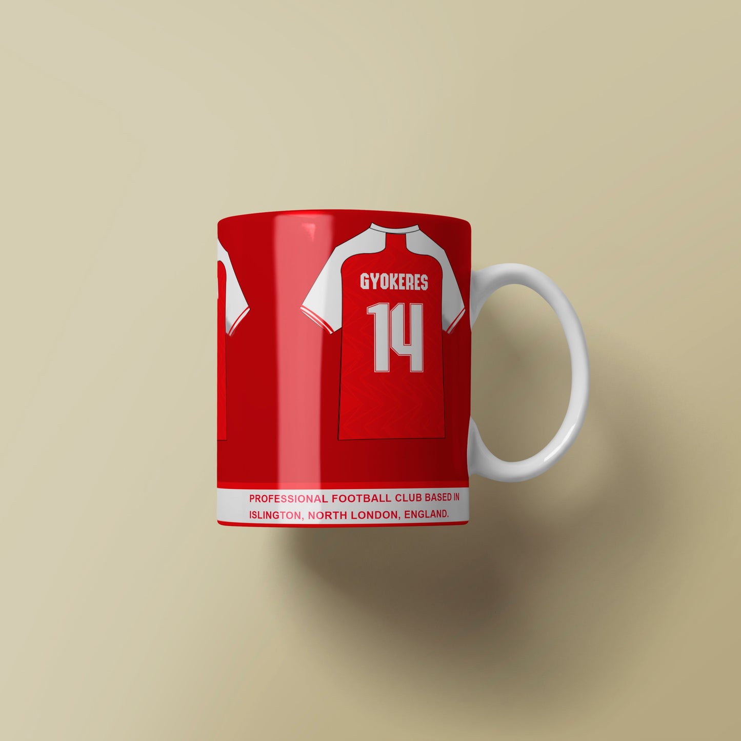 Red mug with white graphics on a beige background