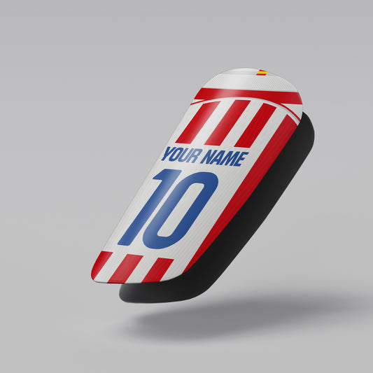 Motorcycle seat with red, white, and blue design on a gray background