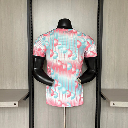 Mannequin wearing a colorful patterned shirt in a store setting