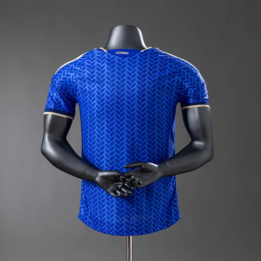 Blue sports jersey on a black mannequin against a gray background