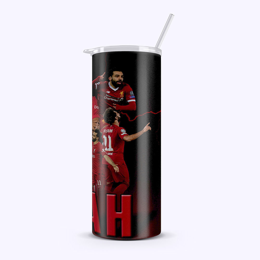 Tumbler with soccer player design on a black background