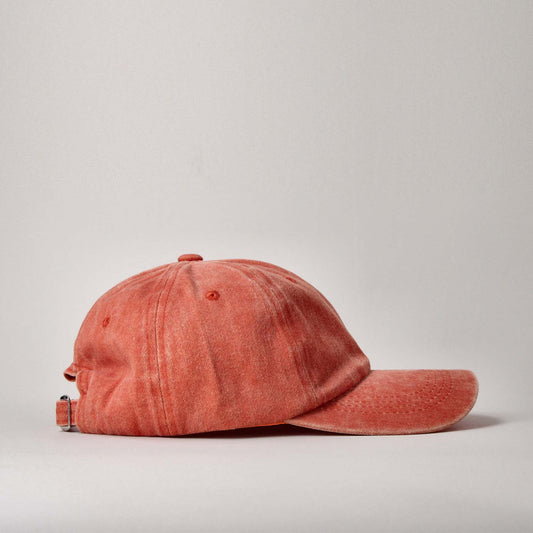 Orange cap on a light gray background