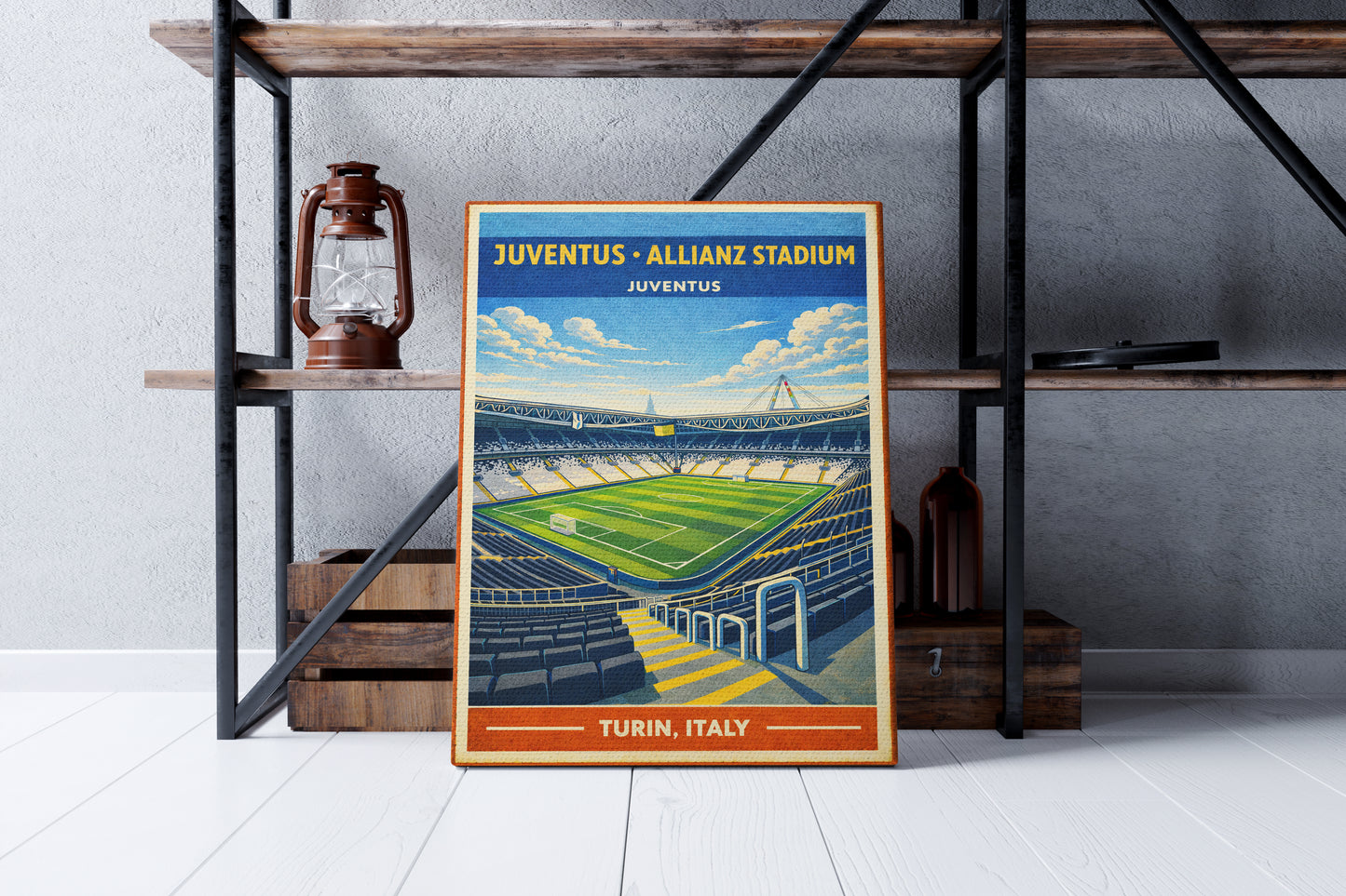 Framed poster of Juventus Allianz Stadium in Turin, Italy on a shelf.
