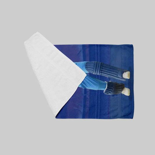 Blue towel with a white logo on a gray background