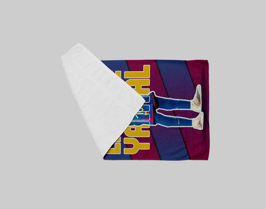 Barcelona football club towel with colorful design on a gray background