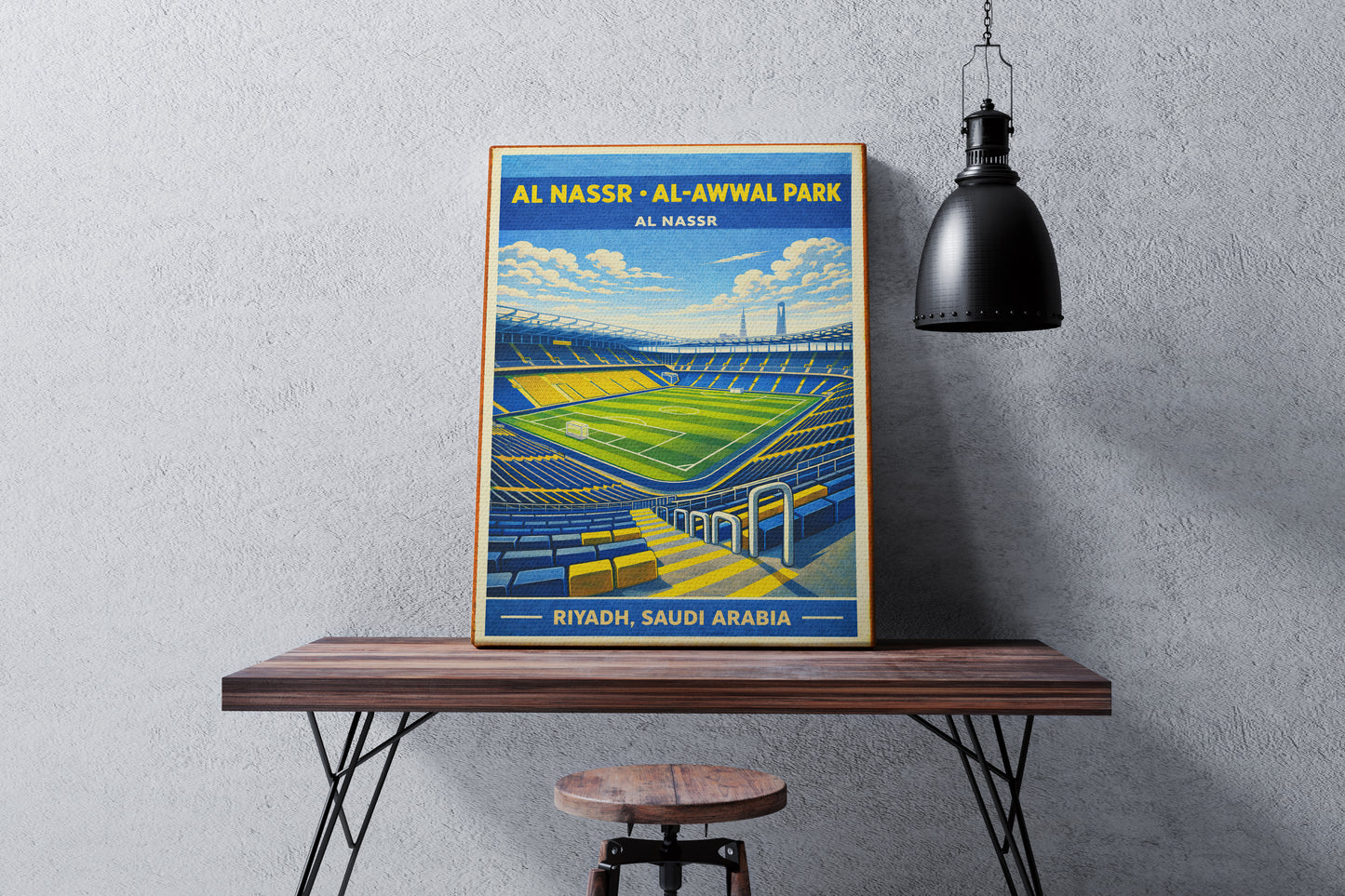 Framed poster of Al Nasser Al-Awwal Park on a wooden table against a gray wall.