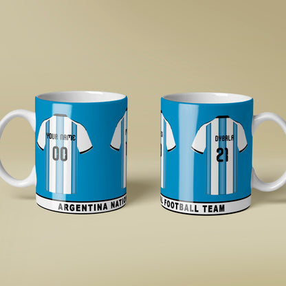 Two mugs with Argentina national football team jerseys on a beige background