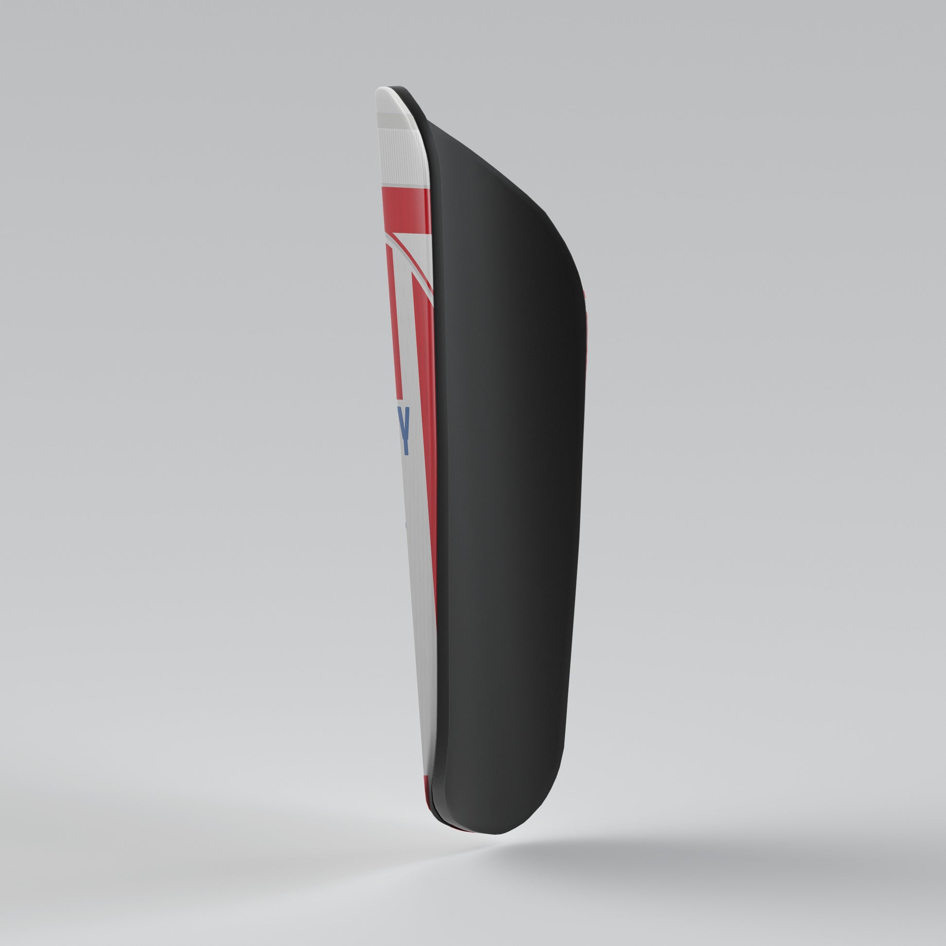 Black shin guard with red and white accents on a gray background