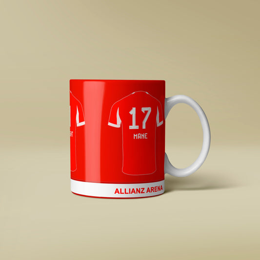Red mug with white accents designed like a sports jersey on a beige background