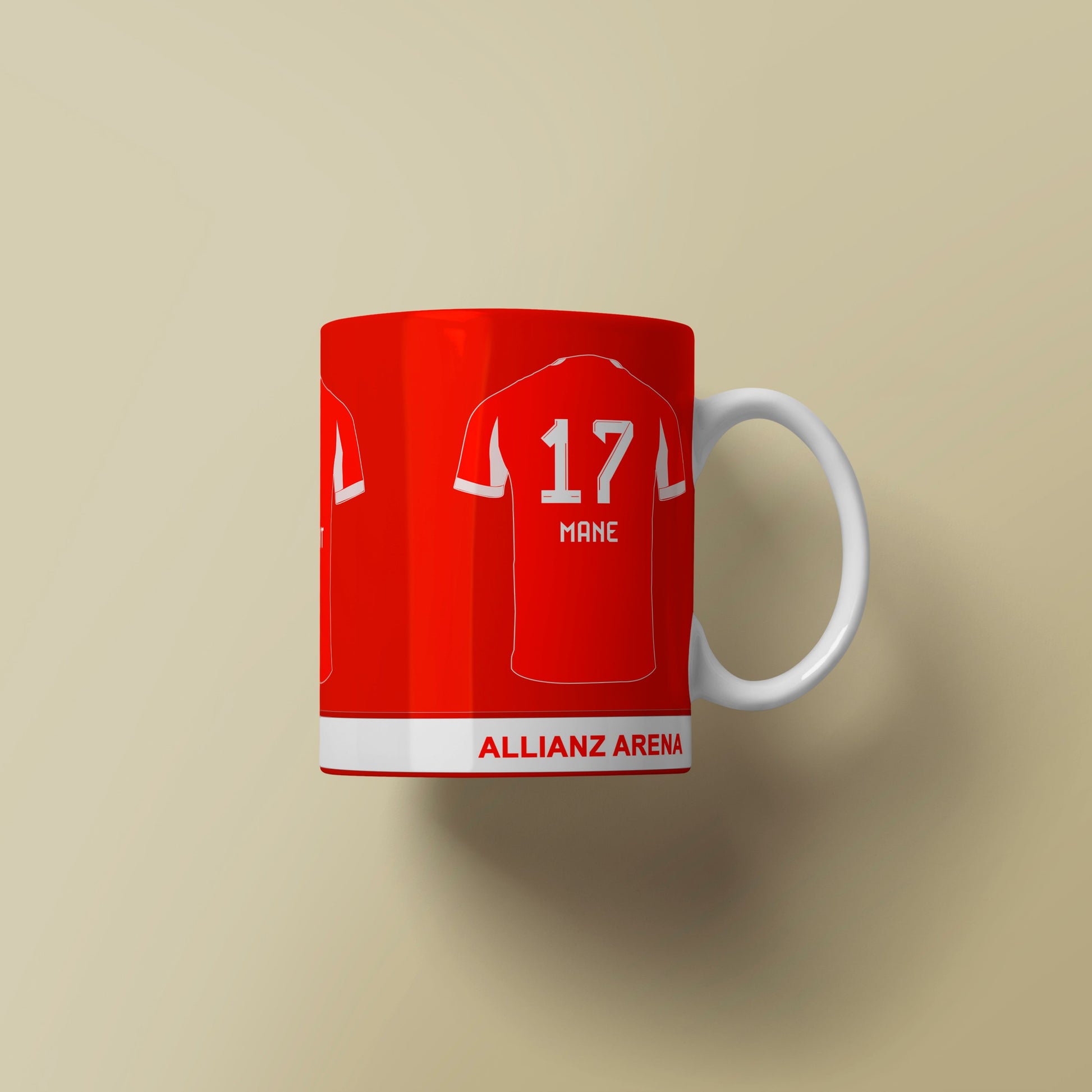 Red mug with soccer jersey design on a beige background