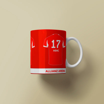 Red mug with soccer jersey design on a beige background