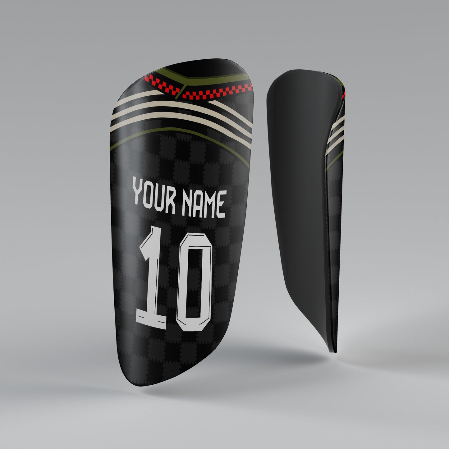 Black shin guard with customizable text on a gray background