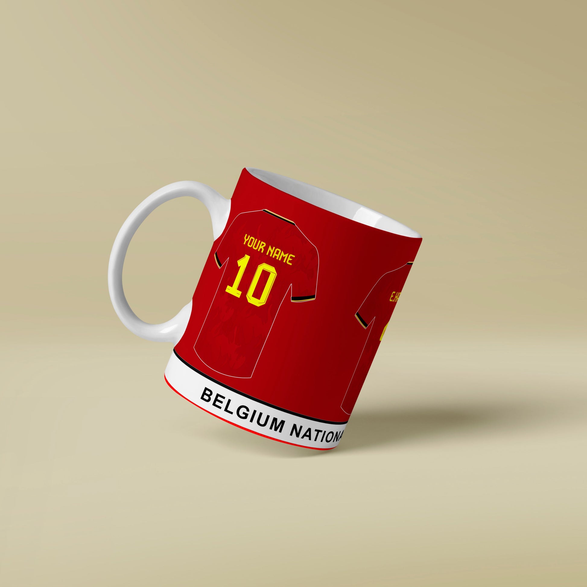 Red mug designed like a Belgium national team jersey on a beige background