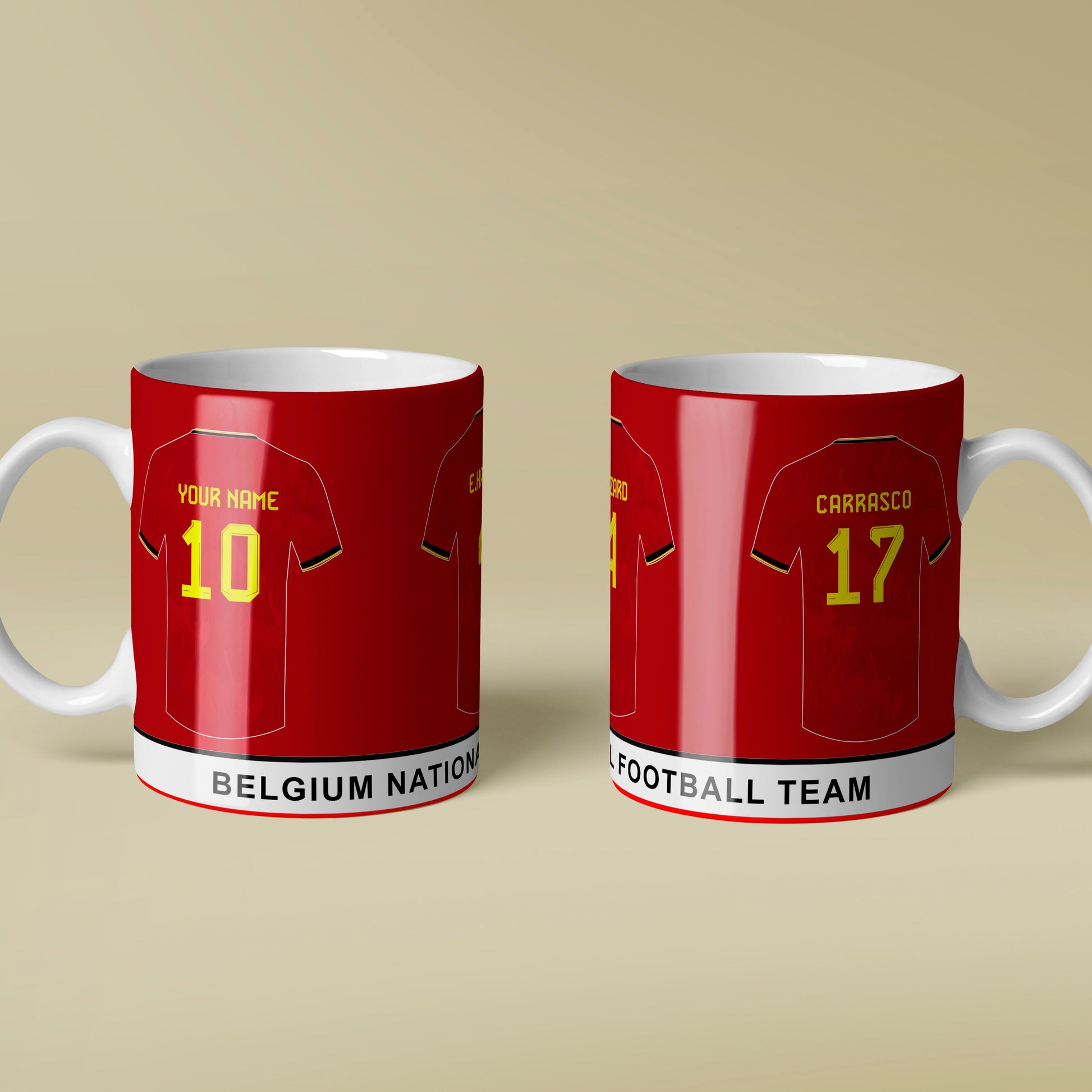 Two red mugs designed to look like Belgium football team jerseys on a beige background.