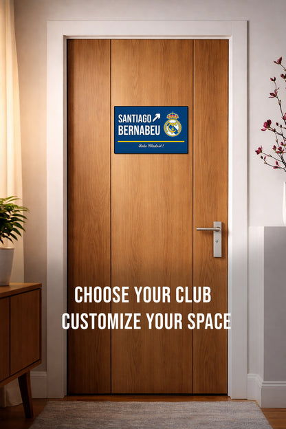 Wooden door with a sign and text 'Santiago Bernabeu' on a wall.