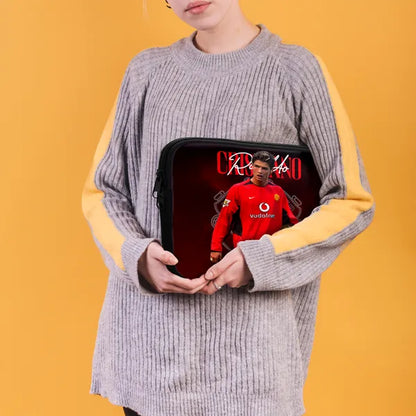Person holding a tablet case with a sports player design on a yellow background