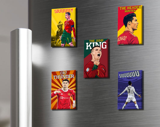 Five soccer-themed magnets on a metallic surface