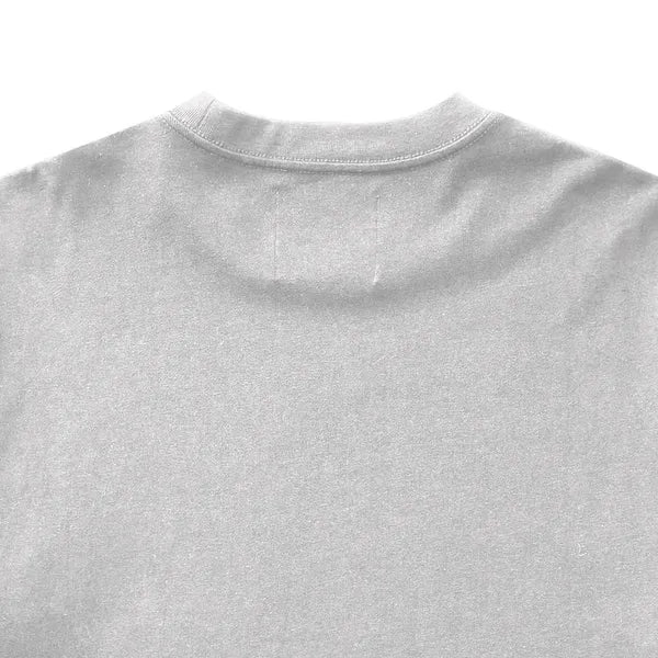 Close-up of a gray t-shirt with a focus on the neckline.