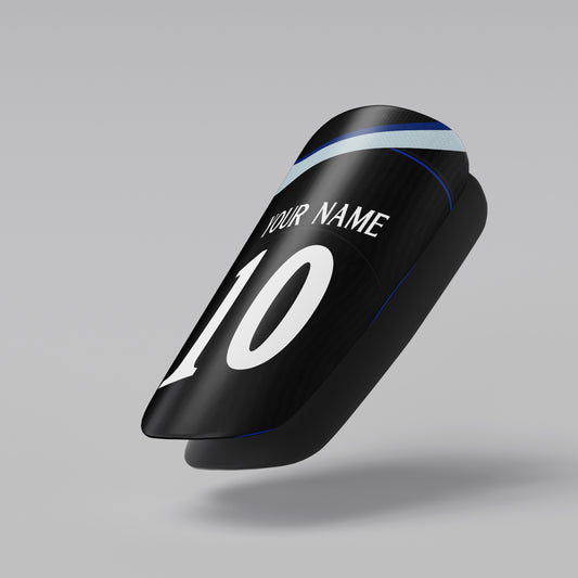 Black shoe with customizable text on a gray background