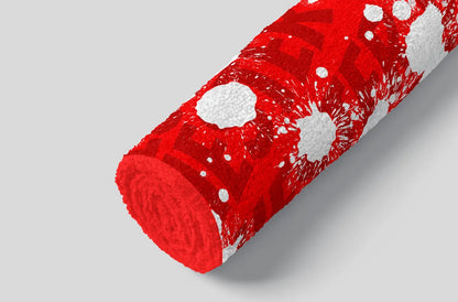 Red cylindrical object with white circular patterns on a gray background