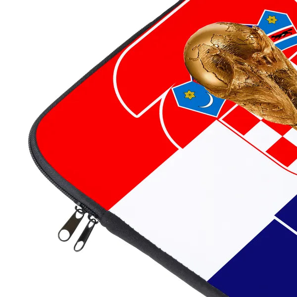 Laptop sleeve with a gold skull design on a red, white, and blue background