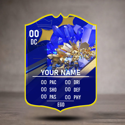 Fantasy game card with blue and gold design on a wooden surface