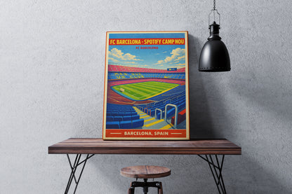 Poster of FC Barcelona's Camp Nou stadium on a wooden table against a gray wall.