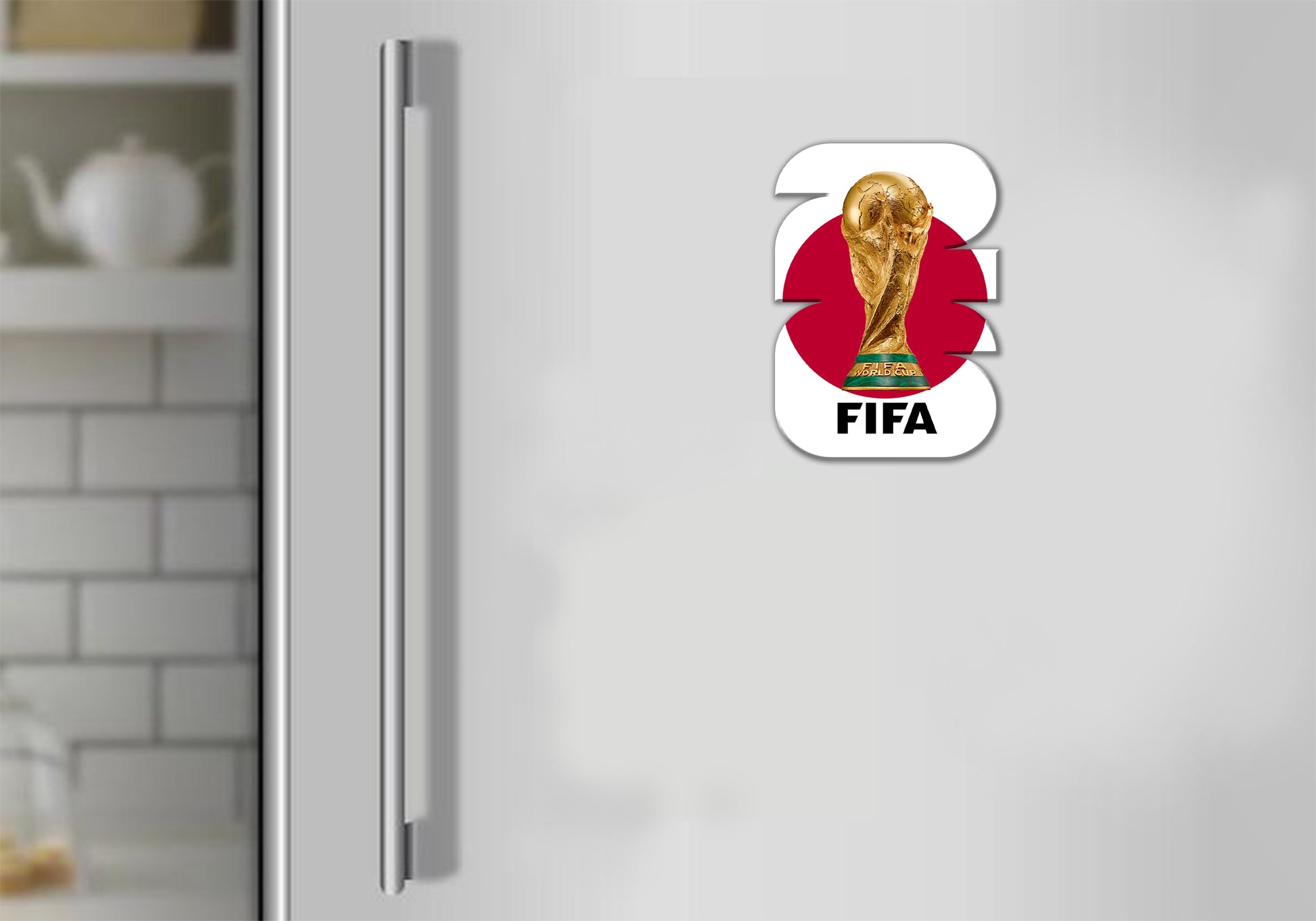 FIFA logo on a refrigerator door in a kitchen setting