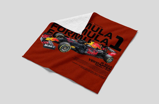 Red Formula 1-themed towel with a car design on a gray background