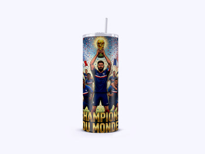 Tumbler with a soccer player holding a trophy and 'Champion du Monde' text on a white background