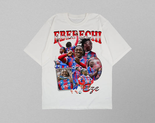 White t-shirt with colorful graphics and text on a gray background