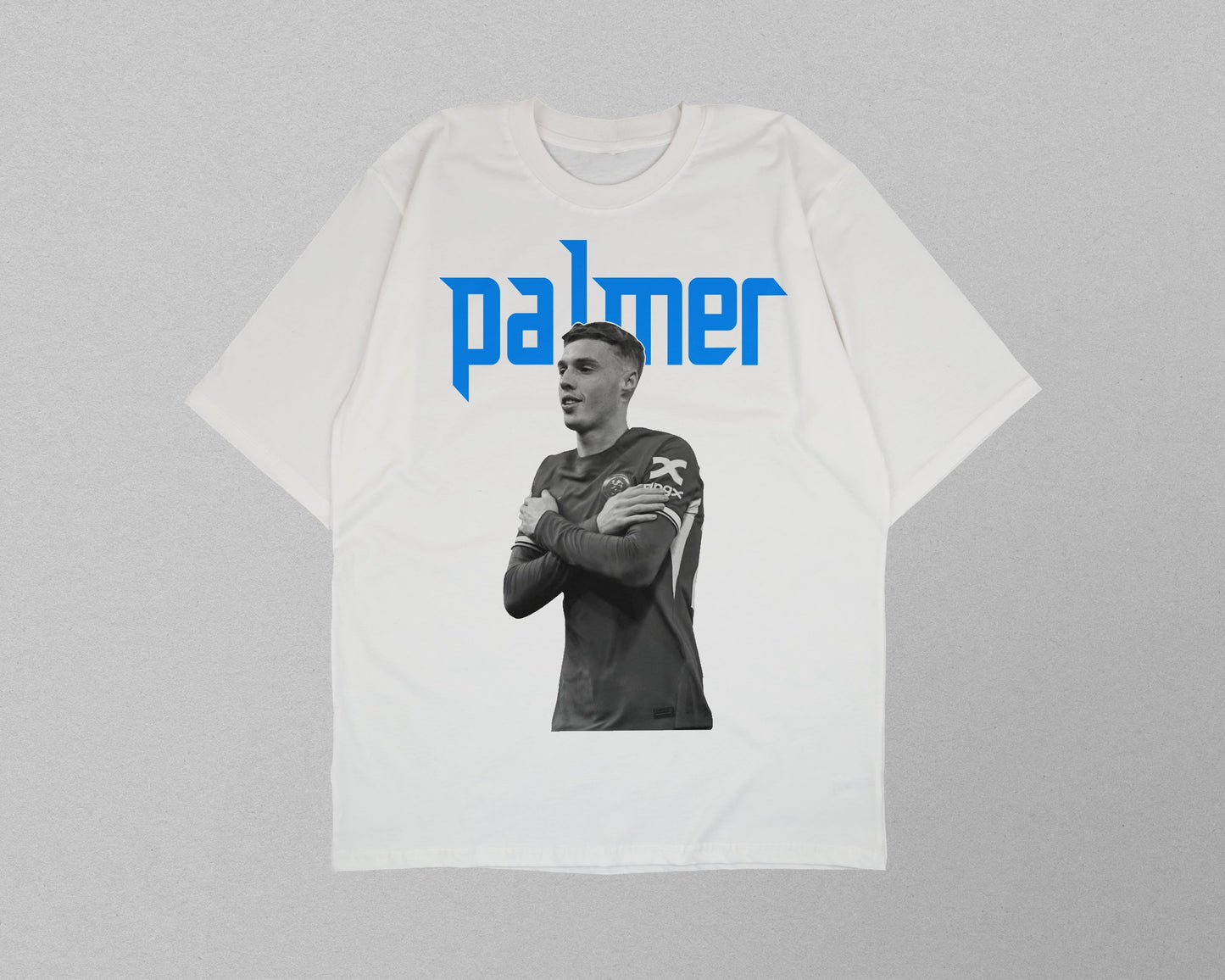 White t-shirt with a black and white photo and 'palmer' text on a gray background