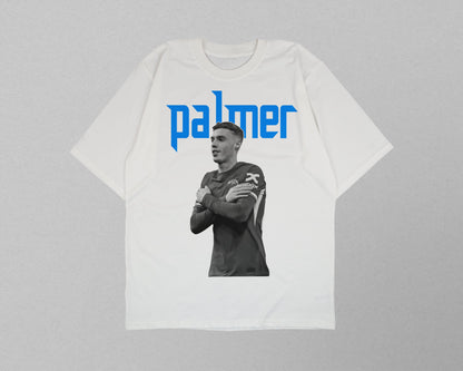 White t-shirt with a black and white photo and 'palmer' text on a gray background