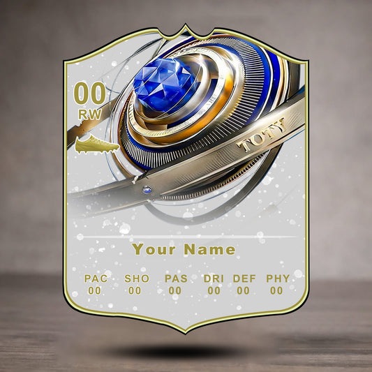 Decorative card with a blue gem and gold accents on a gray background
