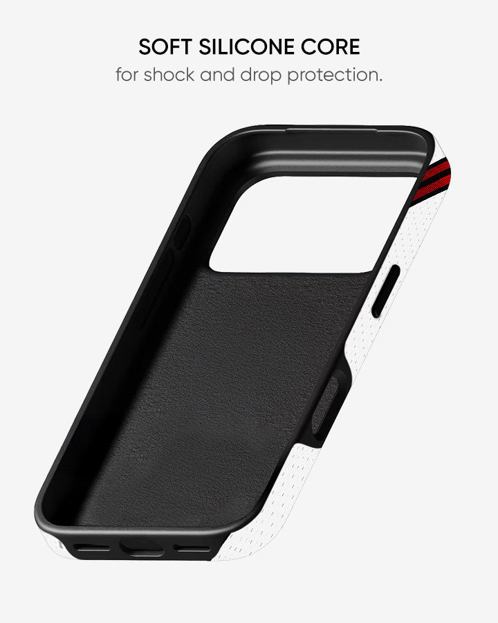Black phone case with soft silicone core for shock and drop protection on a white background