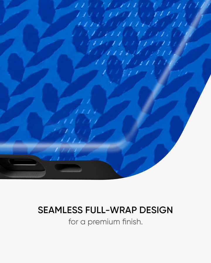 Blue patterned phone case with text 'Seamless full-wrap design for a premium finish' on a white background
