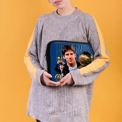 Person holding a clutch with a graphic of a person holding a trophy against a yellow background