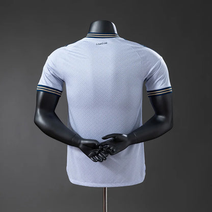 White sports jersey with black sleeves on a mannequin against a gray background