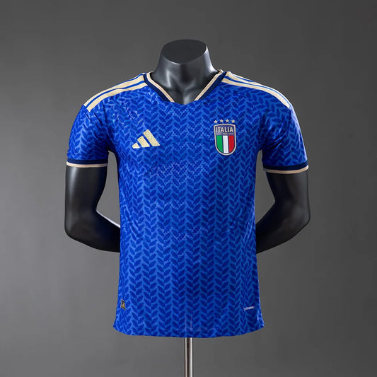 Blue sports jersey with Italian flag and Adidas logo on a mannequin against a gray background