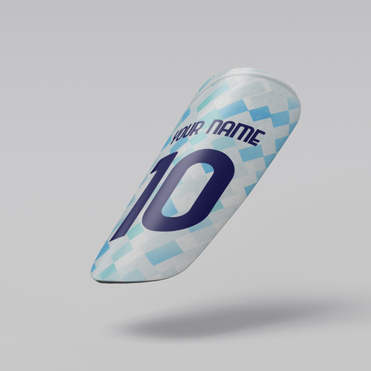 Sneaker with blue and white pattern on a gray background