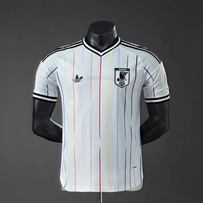White sports jersey with colorful stripes on a mannequin against a dark background