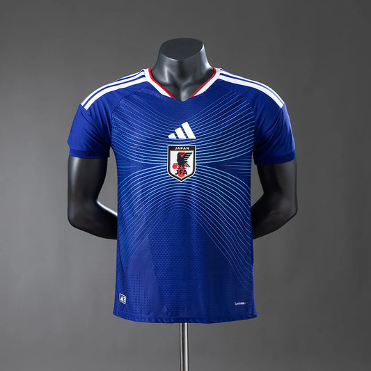 Blue sports jersey with a logo on a mannequin against a gray background