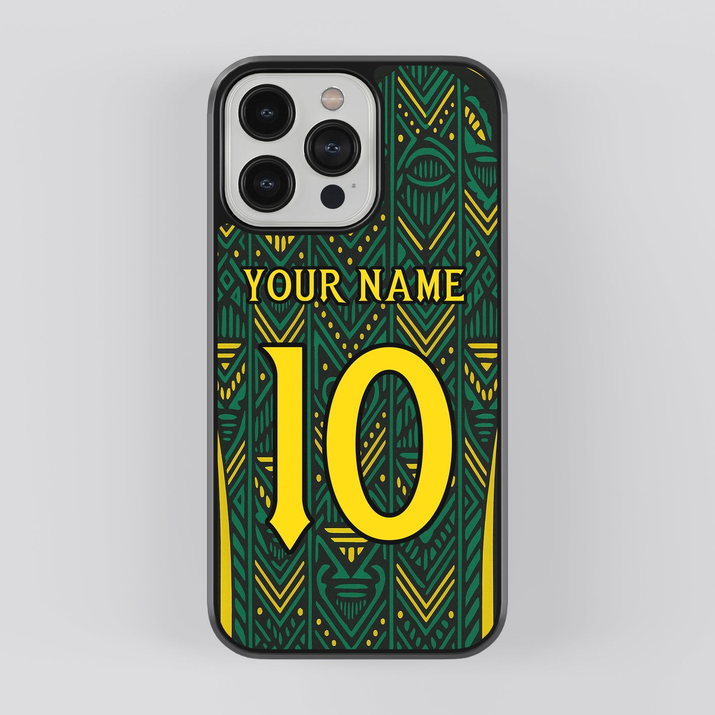 Phone case with green and yellow design, space for text on a gray background