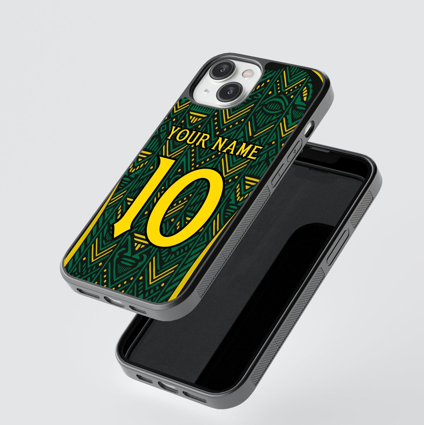 Phone case with green and yellow design and space for personalization on a gray background
