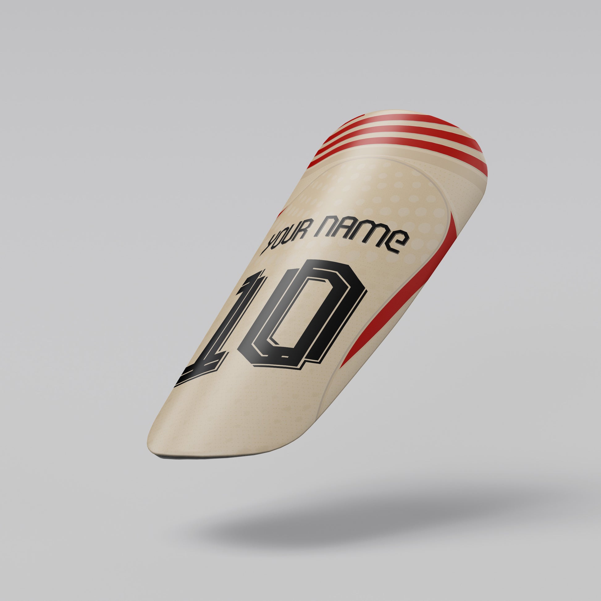 Beige cricket bat with red and black design on a gray background