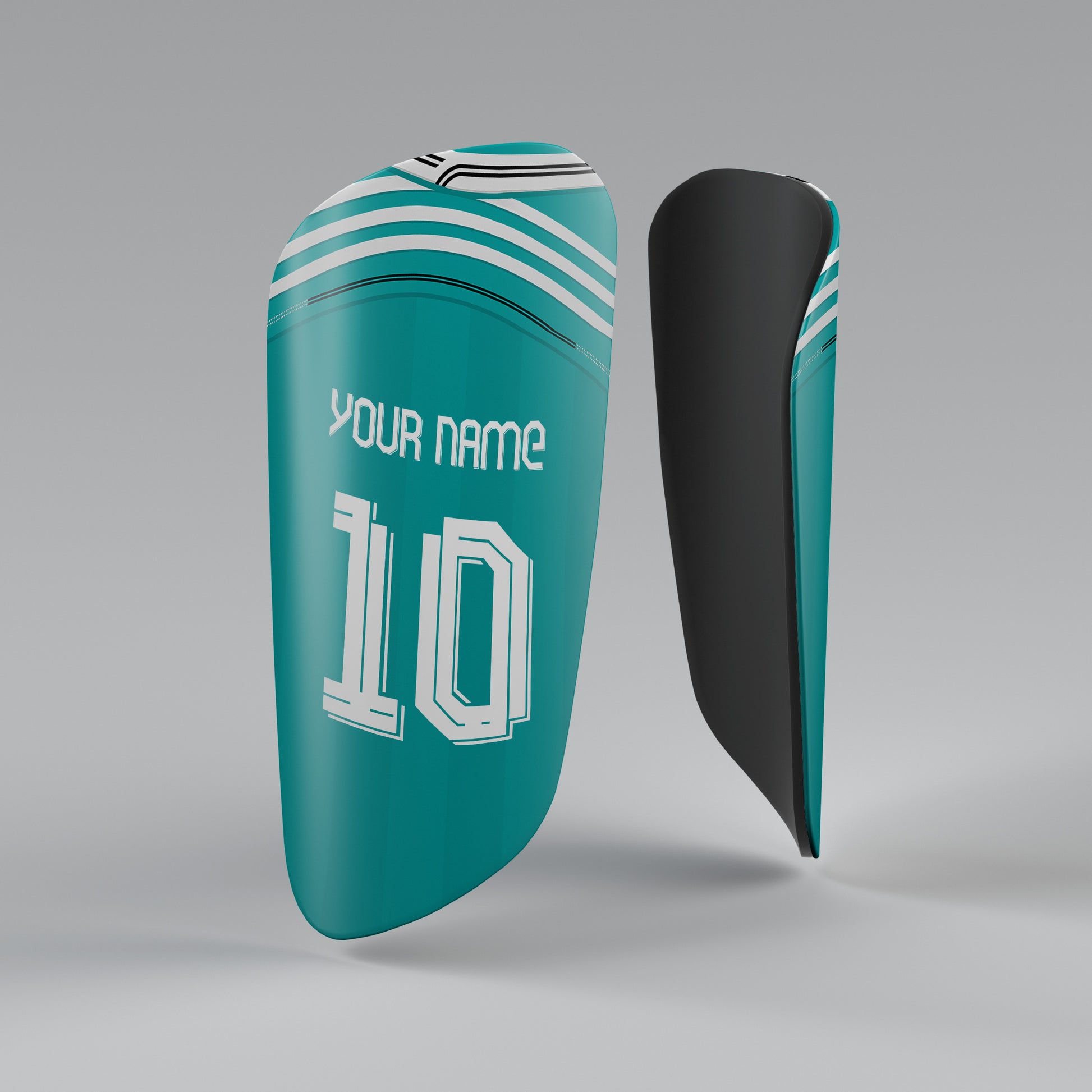 Teal shin guard with white text on a gray background