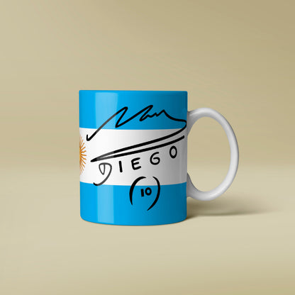 Mug with blue band featuring a signature and text on a beige background