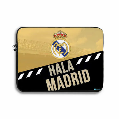 Laptop sleeve with Real Madrid logo and 'Hala Madrid' text on a gold and black background